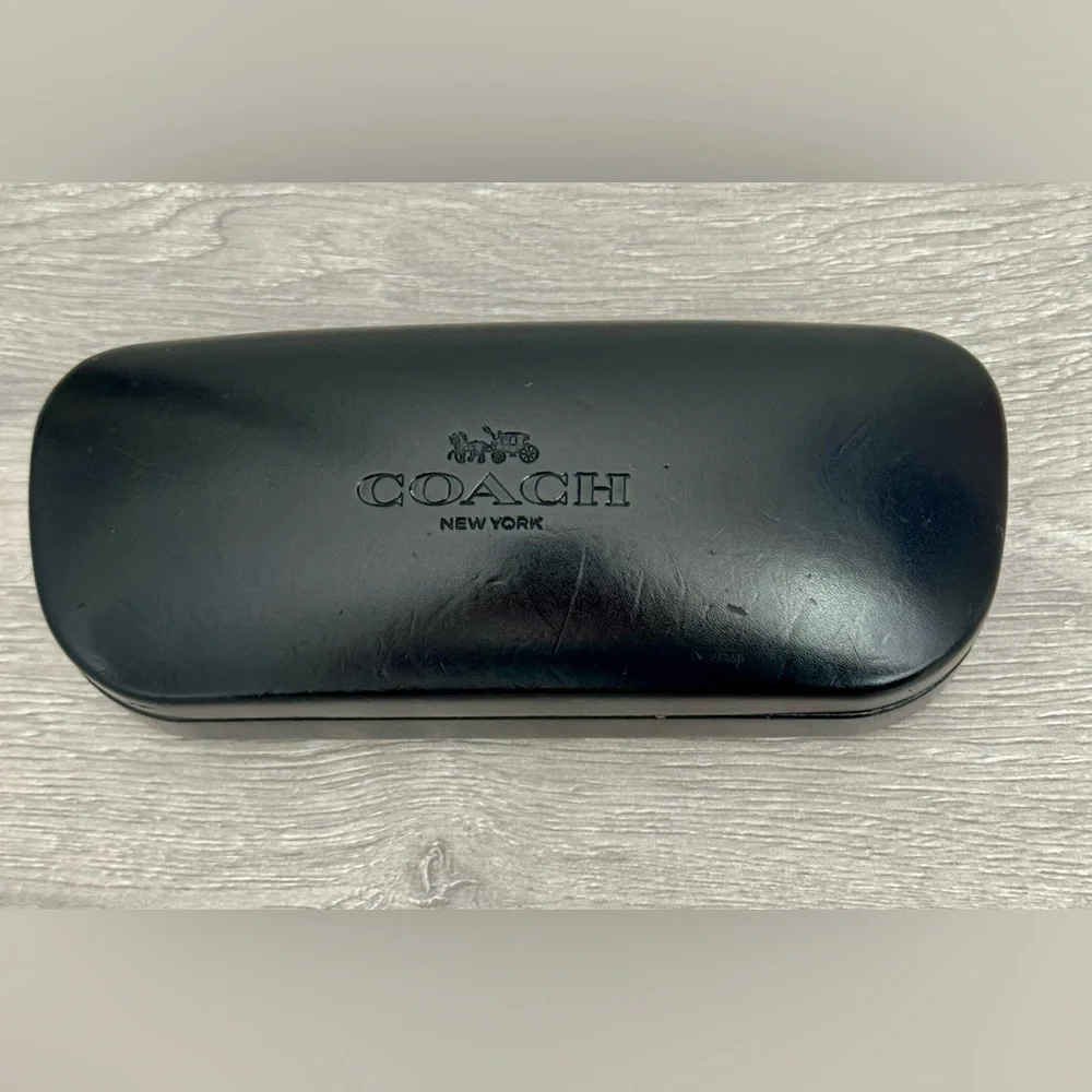 COACH New York Glasses case Black. Used. Has some small dents. See photo.